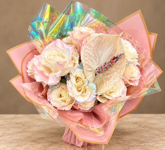 Pastel bouquet with ivory and pink flowers